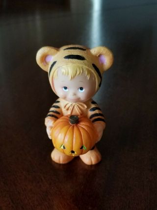 Ruth Morehead Inc Child In Tiger Costume Holding Pumpkin Figurine