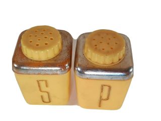 Vintage Plastic Yellow And Silver Salt & Pepper Shakers