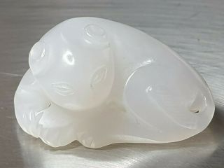 A Fine Qing Dynasty Pure White Jade Carved As A Recumbent Cat.