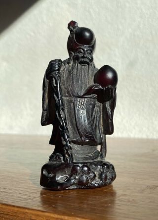 Antique Chinese Dark Faux Cherry Amber Bakelite Shou Lao Figure Detailed Carving