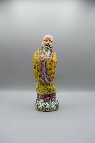 A large Chinese famille rose figure of an immortal 20th C. 2
