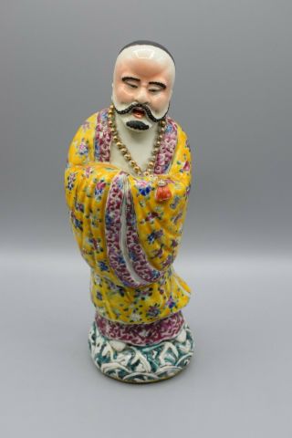 A large Chinese famille rose figure of an immortal 20th C. 3
