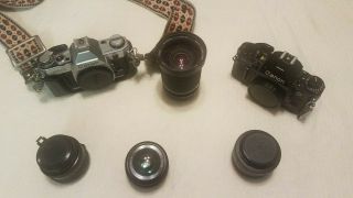 Two Vintage Canon A - 1 & Ae - 1 Cameras Plus Lenses And Accessories - See Details