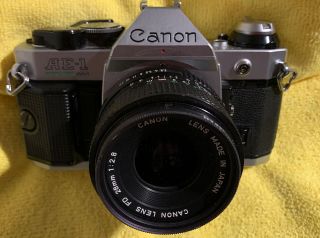 Vintage Canon AE - 1 SLR Film Camera W/ Canon FD 28mm 1:2.  8 Lens & L37c UV Filter 2