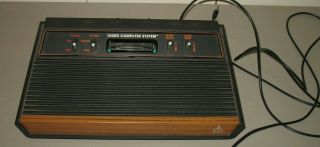 Vintage Atari Game System & Center,  27 Cartridges,  15 instructions,  joysticks more 2