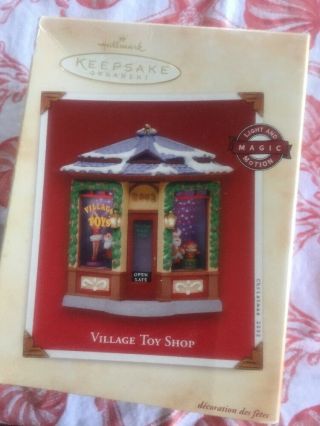Hallmark Christmas Tree Keepsake Ornament Village Toy Shop Light Motion 2002