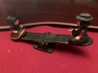 Vintage Cast Iron Amish Quaker Boy & Girl On Seesaw,  Teeter Totter And Iron