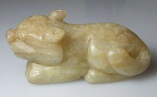 A Rare Qing Dynasty Jade Carving Of A Recumbent Dog.