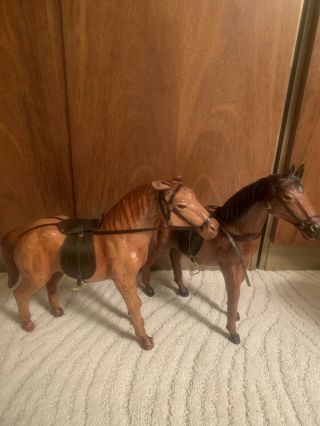 Two Vintage Artist Made Handmade Leather Horse 8 1/2” By 11”.  Brown.  Glass Eyes