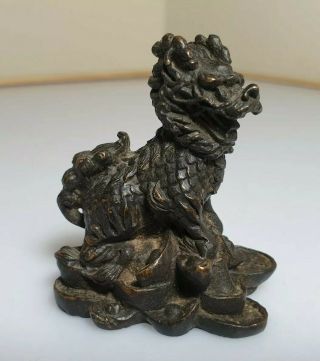 A Lovely Qing Dynasty Bronze Scroll Weight Of A Qilin Sat On Coins & Sycee.