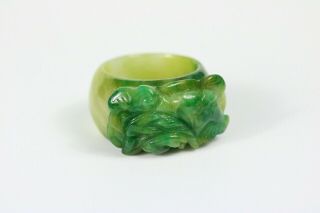 Chinese Vintage Jade Saddle Ring Of A Good Colour,  Size - V,  Outface Carvings