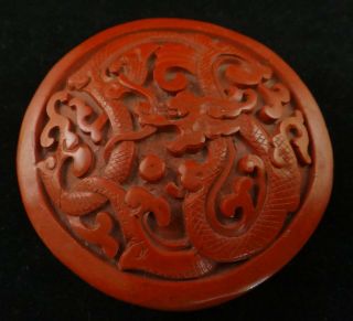Antique Chinese Carved Cinnabar Round Lidded Box,  Dragon,  Early 20th.  2 7/8” D.