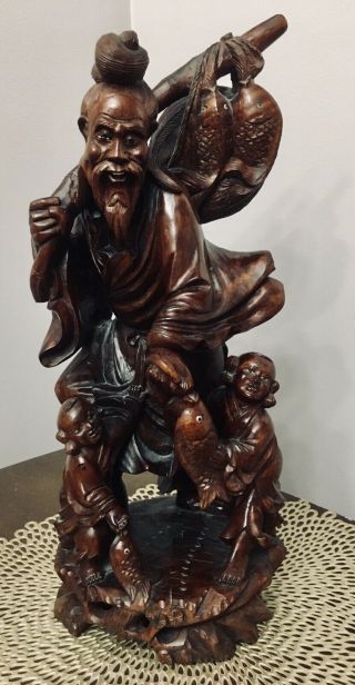 Large Vintage Chinese Hand Carved Wood Figure Of Man With Fish & Children 13.  5”