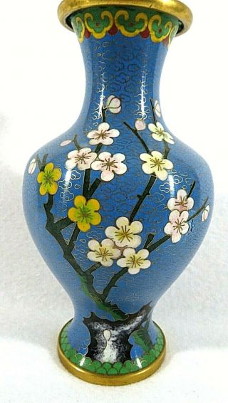 Vintage Chinese Cloisonné Vase With Flowers And Bird On A Blue Background
