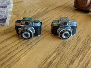 2 Vintage Sanwa Mycro Cameras w/ Leather Cases,  Tripod,  Filter,  34 Rolls of Film 3
