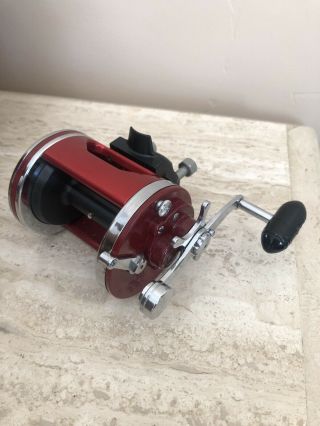 Penn Squidder 140 Saltwater Baitcaster Fishing Vintage Reel With Rod Clamps