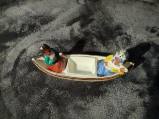 Vintage Native American In Canoe Salt And Pepper Shakers 2