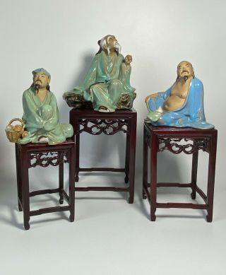 3 Vintage Chinese Shiwan Pottery Ornaments Seated On Modern Wooden Stands 34cm