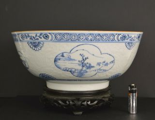 An 18th Century Chinese Porcelain Punch Bowl With Raised White Enamel Decoration