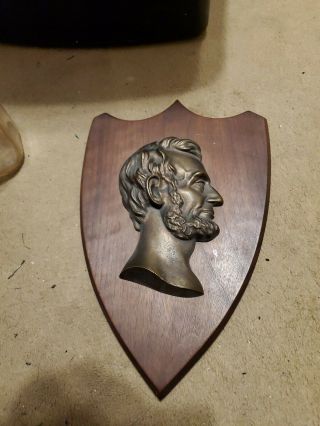 Vintage Abraham Lincoln Bronze Plaque Casting Wood Wall Mount Shield Bust Cameo