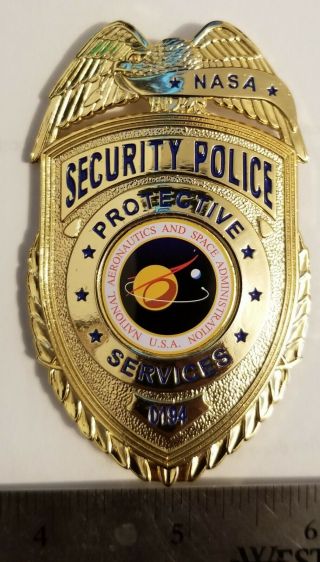 Nasa Security Police Gold Metal Badge.  Serial Numbered With Nasa Seal