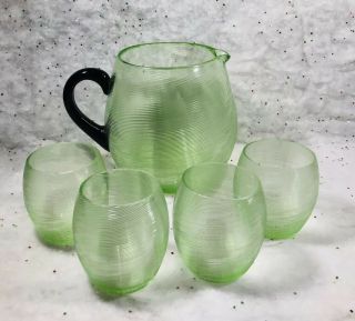 Vintage Green Vaseline Glass Juice Set Pitcher 4 Cups Black Handle Swirl Pattern