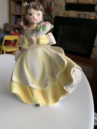 Vcagco High Fashion Yellow Victorian Thin Girl Holding Flowers