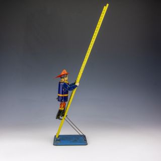 Vintage Louis Marx Toys - Tinplate Clockwork Ladder Climbing Fireman Automaton