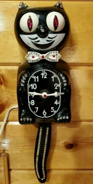 Vintage 1960 ' s kit cat clock,  electric,  D8 Black Jeweled 3