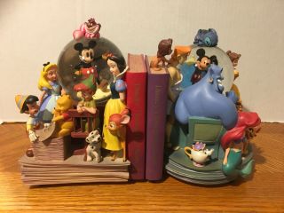 Disney Store World Of Disney Through The Years Book End Snow Globe Set