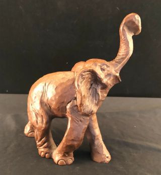 Resin Elephant Figurine That Looks Like Carved Wood
