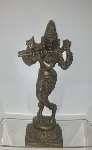 A Antique Bronze Figure Of The Hindu God Krishna Playing The Flute