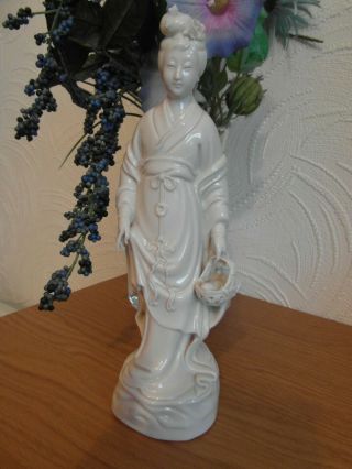 Blanc De Chine Chinese Porcelain Figure Of A Woman With Fish In Basket
