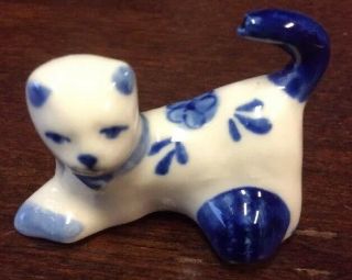 Miniature Delft Blue Ceramic Kitty Cat Playing With Ball On Back Paw 1 1/4 "