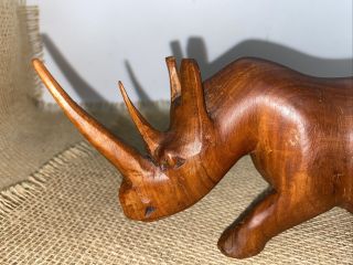 vintage African carved solid wood Rhinoceros Rhino 9.  0 inches long statue 3 3