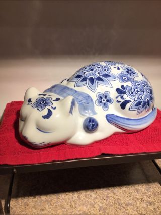 Porcelain Sleeping Cat With Blue And White Flowers