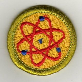 Retired - Atomic Energy Merit Badge,  Type H,  Clear Plastic Back (1972 - 2002)