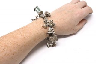 A Heavy Vintage Sterling Silver 925 Charm Bracelet With Great Charms 24874