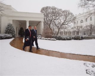 President Barack Obama Leaves White House During A Snowstorm Photo Print