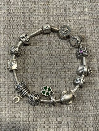Vintage Pandora Bracelet With 11 Charms.  925 Ale Authentic Retired Charms?