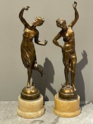 A French Art Deco Spelter Dancing Ladies On Marble Bases