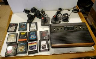 Vtg.  Atari 2600 System Complete Console 2 Joy Sticks Paddles 11 Games