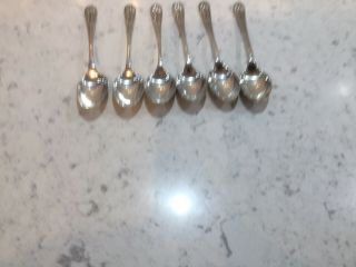 A Set Of Six Art Nouveau Coffee Spoons.  Silver Plate Decorated Shaft.  4.  25” Long