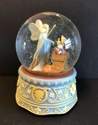 Disney Enesco Pinocchio & Blue Fairy Musical Snow Globe Plays " Toy Land "