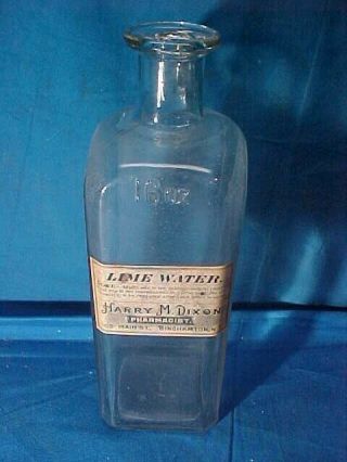 Early 20thc Lime Water Drug Store Glass Advertising Bottle W Orig Paper Label