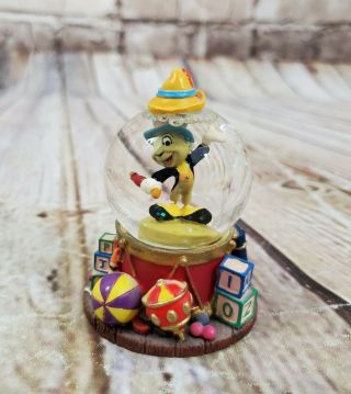 Disney Store Jiminy Cricket Pinocchio Mini Snow Globe 3”