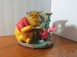 Disney Winnie The Pooh In Hunny Jar Snowglobe.