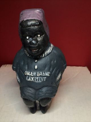 Vintage Cast Iron Bank Dilly Brand Laxative Advertising Has Rubber Stopper