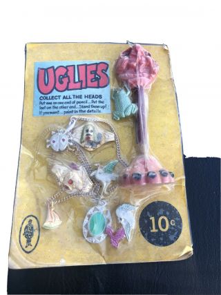 Vintage Bubble Gum Machine Charms / Prizes Header Card Front Of Machine Uglies