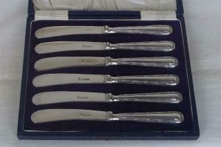 A Fine Case Set Of Six Sterling Silver Handled Butter Spreaders Sheffield 1928.